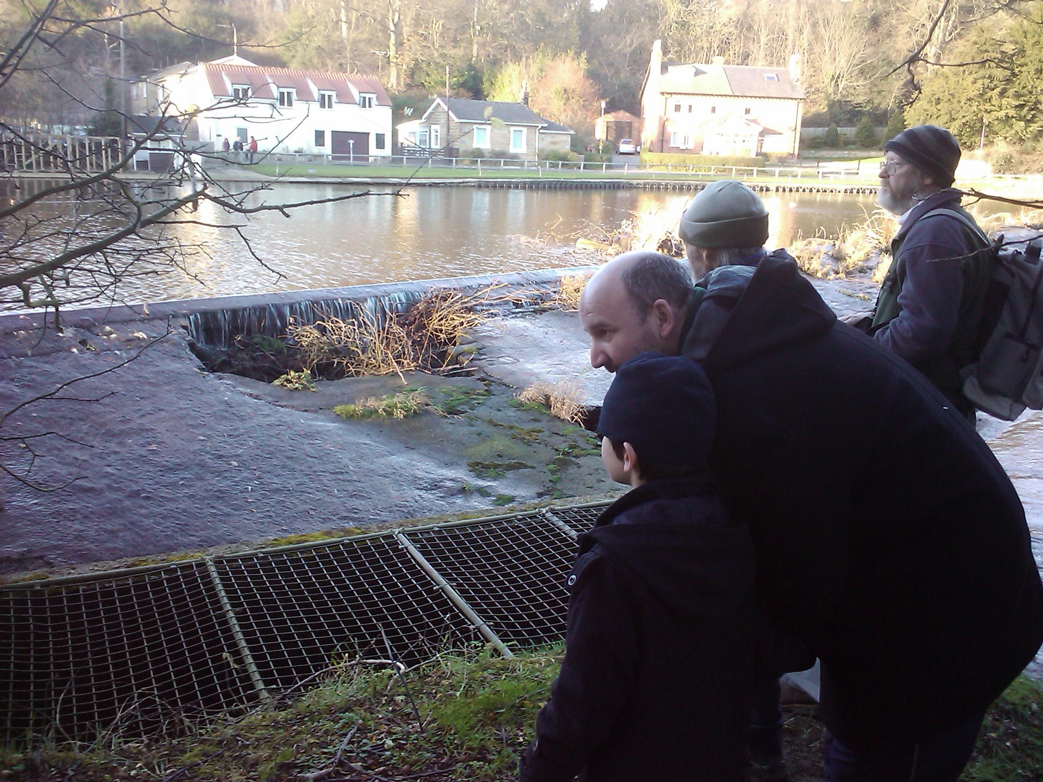 Looking_at_fish_pass_to_be_upgraded